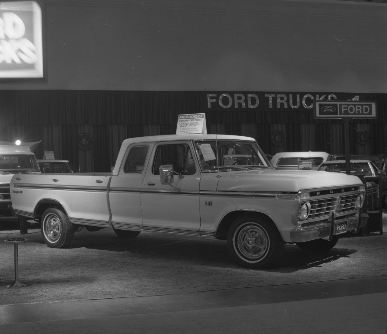 A black and white photo displaying Ford's Super Cab